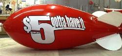 advertising blimps plain - 11ft. From $461.00; artwork additional - giant advertising inflatables made in the USA.